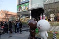 Teenagers waiting in line to enter the Line Friends cafe and shop in Shanghai