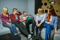 Teenagers waiting for showtime in cinema hall