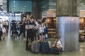 Teenagers waiting for their train in St Pancras International in London