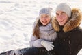 Teens brother and sister having fun snow in winter Royalty Free Stock Photo