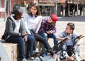 Teens chatting near bikes Royalty Free Stock Photo