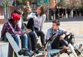 teens chatting near bikes Royalty Free Stock Photo