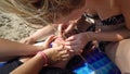 Teens cleaning face acnes on beach Royalty Free Stock Photo