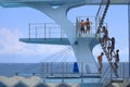 Teens on diving board