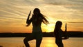 Teens girlfriends holiday disco. party by the lake, children dancing. happy girls dancing on the beach. beautiful girls Royalty Free Stock Photo