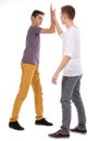 Teens giving high five Royalty Free Stock Photo