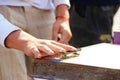 teens hand playing the fingerboard, close-up Royalty Free Stock Photo