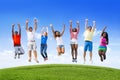 Teens Jumping On a Hill Royalty Free Stock Photo