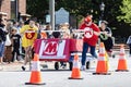 Teens push bed down city street in charity fundraising event