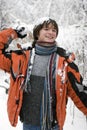 Teens in scarf with snowball