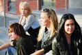 Young fashion teens sitting on steps Royalty Free Stock Photo