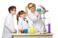 Teens and teacher of chemistry at lesson making