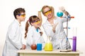 Teens and teacher of chemistry at lesson making