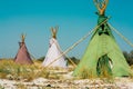 Teepees on the sea shore Royalty Free Stock Photo
