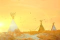 Teepees on the seashore. Architecture of Traditional american culture with sunset background. Alternative builds