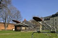 Teeter totters in a park of old buildings