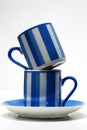 Teetering espresso cups