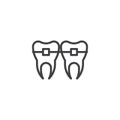 Teeth with brackets line icon