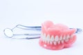 Teeth and dental mirror, symbol photo of dentures.