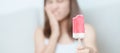 Teeth Sensitive to Cold concept. woman hold Ice cream and having toothache and pain after eat. Tooth Decay or Gum Disease, Royalty Free Stock Photo