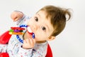 Teething baby girl Royalty Free Stock Photo