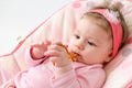 Teething baby girl Royalty Free Stock Photo