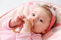 Teething baby girl Royalty Free Stock Photo