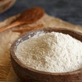 Teff flour in a bowl and teff grain with a spoon