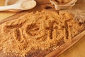 Teff, a gluten free ancient grain alternative with the name spelled in it. Teff has become a popular health food choice Royalty Free Stock Photo