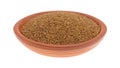 Teff grain filling a small bowl on a white background