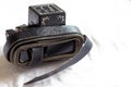 Tefillin with a plastic case, folded and placed on a velvet pocket, in Hebrew - head and hand tefillin