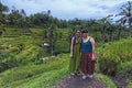 Tegalalang, Bali - November 24th, 2017: Two female traveller from Chile taking photong with the paddy field as the background.