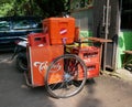 A Teh Botol Gerobak carrying bottles of Cold Tea