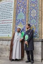 Iranian mullah stands near the mosque, Tehran, Iran.