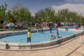 TEHRAN, IRAN - APRIL 2, 2018: People are camping and children playing in the park around Mausoleum of Ruhollah Khomeini Royalty Free Stock Photo