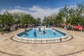 TEHRAN, IRAN - APRIL 2, 2018: People are camping and children playing in the park around Mausoleum of Ruhollah Khomeini Royalty Free Stock Photo