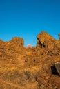 Teide framed by 2 volcanic rocks at Mirador de los Poleos