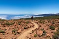 Teide - Front view of woman on hiking trail to Riscos de la Fortaleza, Mount El Teide National Park, Tenerife Royalty Free Stock Photo