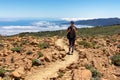 Teide - Front view of woman on hiking trail to Riscos de la Fortaleza, Mount El Teide National Park, Tenerife Royalty Free Stock Photo