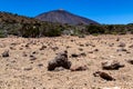 Teide - Pumice stones on desert plain La Canada de los Guancheros. Scenic view on volcano Pico del Teide Royalty Free Stock Photo