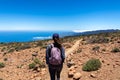 Teide - Rear view of woman on hiking trail to Riscos de la Fortaleza, Mount El Teide National Park, Tenerife Royalty Free Stock Photo