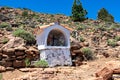 Teide - Small white chapel on the hiking trail leading to Riscos de la Fortaleza near volcano Pico del Teide. Royalty Free Stock Photo