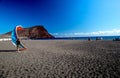 Tenerife, Tejita Beach and Montana Roja   clear volcanic rock texture to red volcanic sand Royalty Free Stock Photo