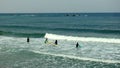 Tel Aviv. Blue sky. White clouds. Birch water. The sun. The waves. Surfing.