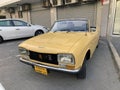 Vintage Peugeot car in a parking lot in Tel Aviv