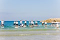 Tel Aviv, Israel, August 12th, 2018: Lots of tourists and locals are swimming at blue Mediterranean sea and spending