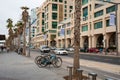 2.01.2023, Tel Aviv, Israel. Tel-Aviv city background. Street near the beach and Mediterranean Sea. Buildings, hotels, people and Royalty Free Stock Photo