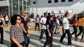 Unidentified citizens dancing traditional Israeli dances on Tel Aviv Promenade