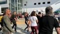 Unidentified citizens dancing traditional Israeli dances on Tel Aviv Promenade