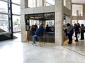 Spectators near a small cafe in the interior of the Chamber Theater hall